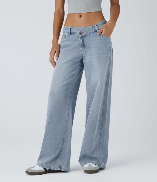 Baggy Flex™ - Jeans casuales anchos de lavado desgastado, tiro bajo, y diseño asimétrico.