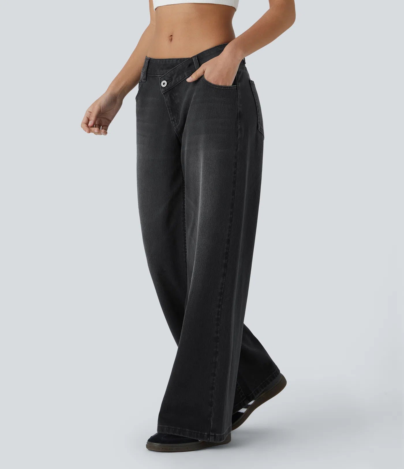 Baggy Flex™ - Jeans casuales anchos de lavado desgastado, tiro bajo, y diseño asimétrico.
