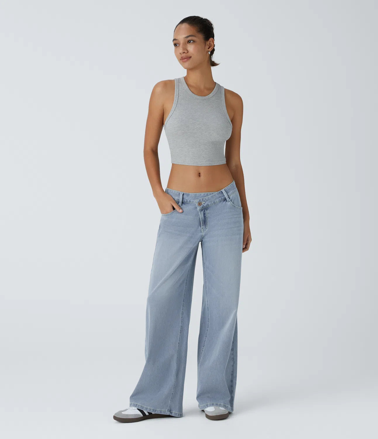 Baggy Flex™ - Jeans casuales anchos de lavado desgastado, tiro bajo, y diseño asimétrico.